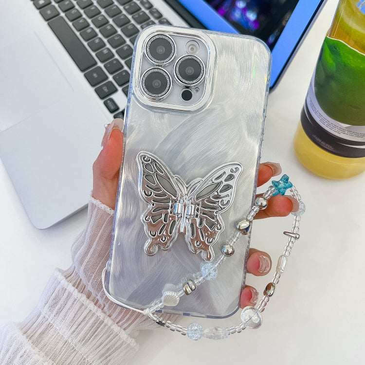 Plating Glitter Lens Film Texture Butterfly Holder Wristband Phone Case, For iPhone 16 Pro Max