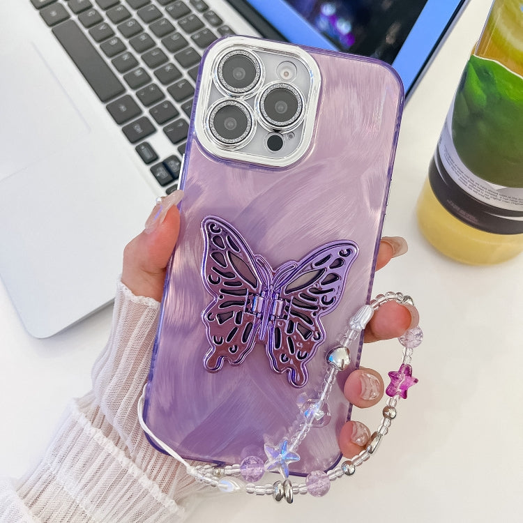 Plating Glitter Lens Film Texture Butterfly Holder Wristband Phone Case, For iPhone 15 Pro
