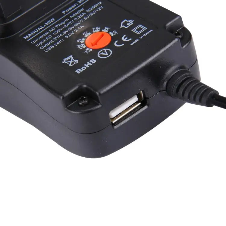 UK Plug Universal 30W Power Wall Plug-in Adapter with 5V 2.1A USB Port Tips: 8 PCS Cable Length: About 1.2m UK Plug