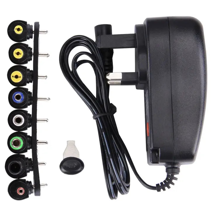 UK Plug Universal 30W Power Wall Plug-in Adapter with 5V 2.1A USB Port Tips: 8 PCS Cable Length: About 1.2m UK Plug