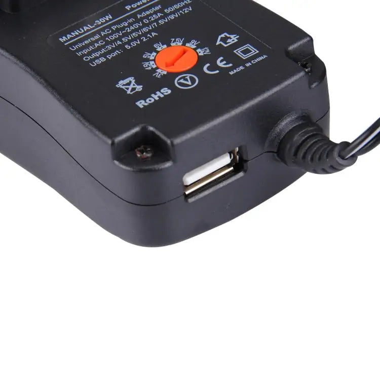 US Plug Universal 30W Power Wall Plug-in Adapter with 5V 2.1A USB Port Tips: 6 PCS Cable Length: About 1.2m US Plug
